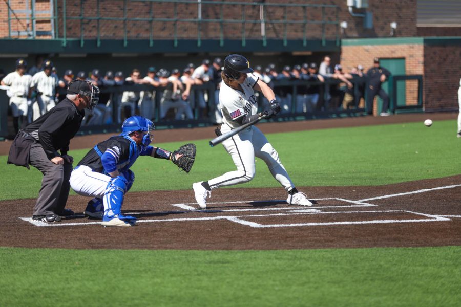 Chuck Ingram takes a swing during WSUs game against South Dakota State on March 13 inside Eck Stadium.