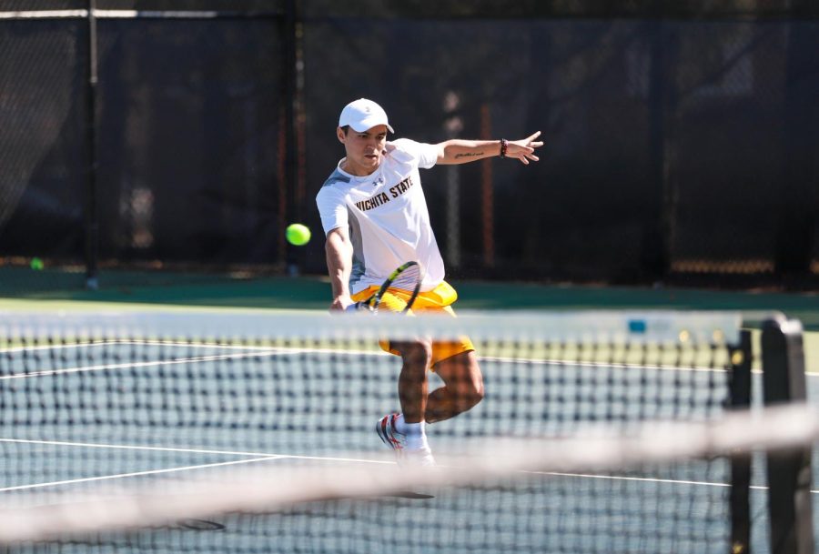 Nicolas Acevedo hits the ball during a point during the match against Omaha on March 3 at the Coleman Tennis Complex. 