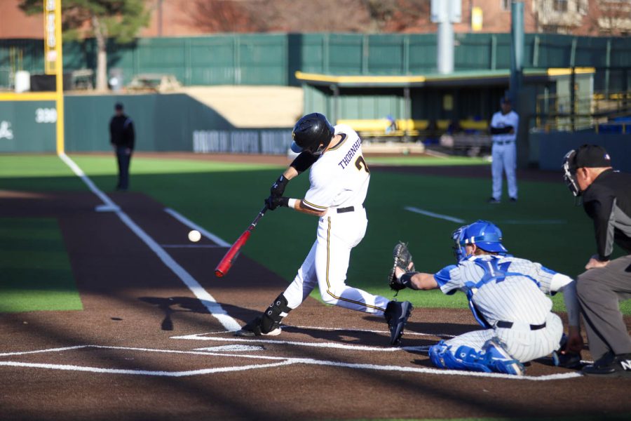 Sawyre Thornhill takes a swing during WSUs game against Creighton on March 25 inside Eck Stadium.