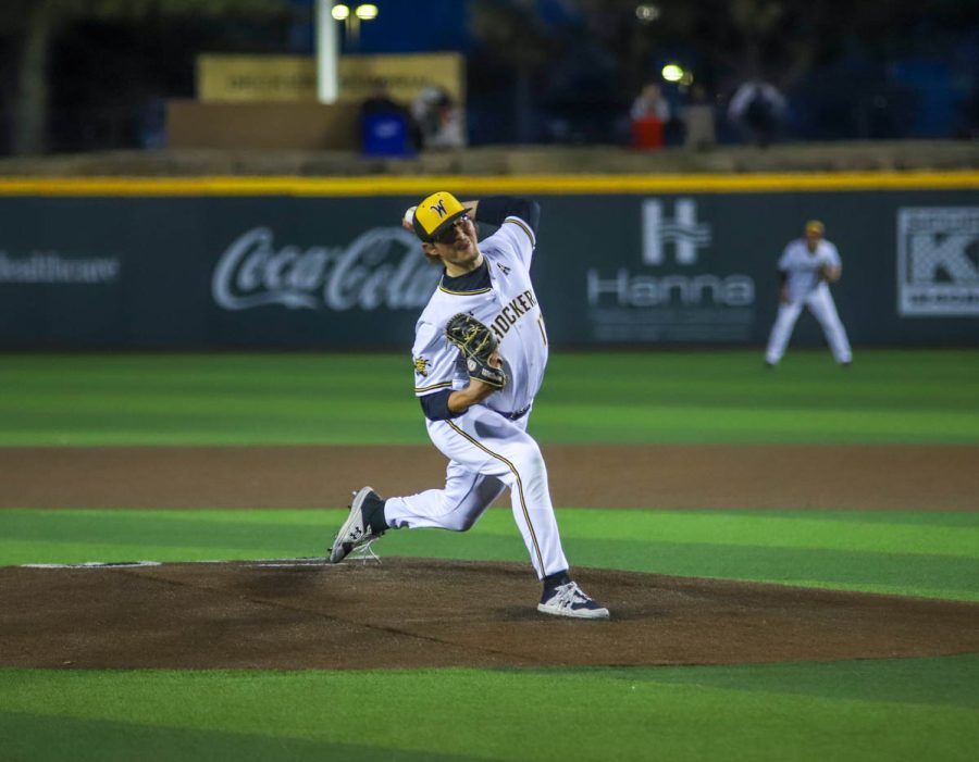 Caden Favors throws a pitch during WSUs game against Creighton on March 25 inside Eck Stadium.