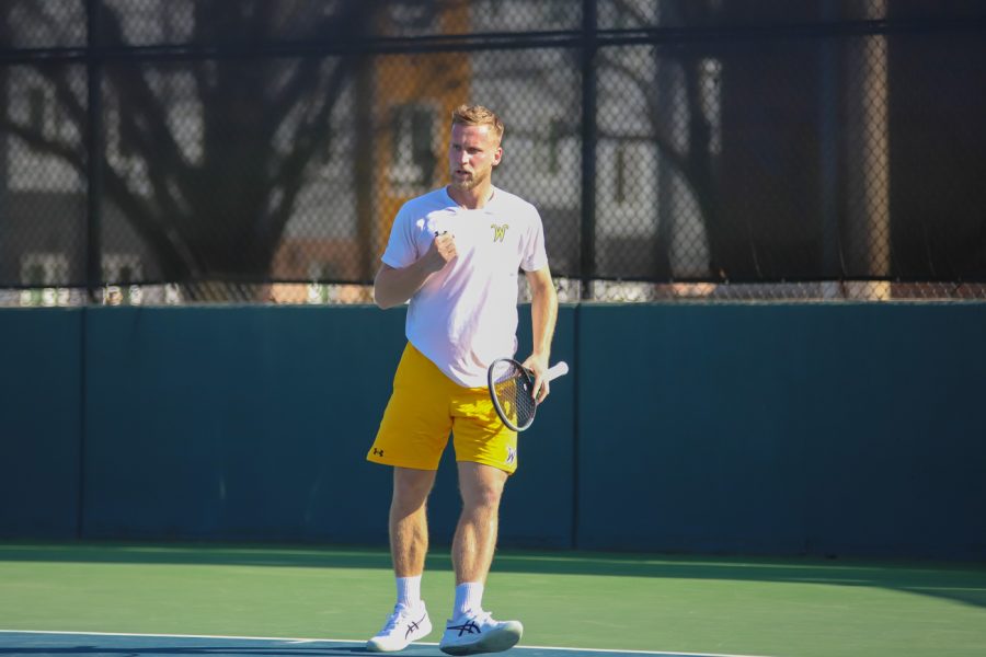 Freshman+Kristof+Minarik+celebrates+after+winning+the+singles+match+against+Northwest+Missouri+State.+Minarik+competed+in+two+undefeated+rounds+on+Mar.+26+in+the+Sheldon+Coleman+Tennis+Complex.