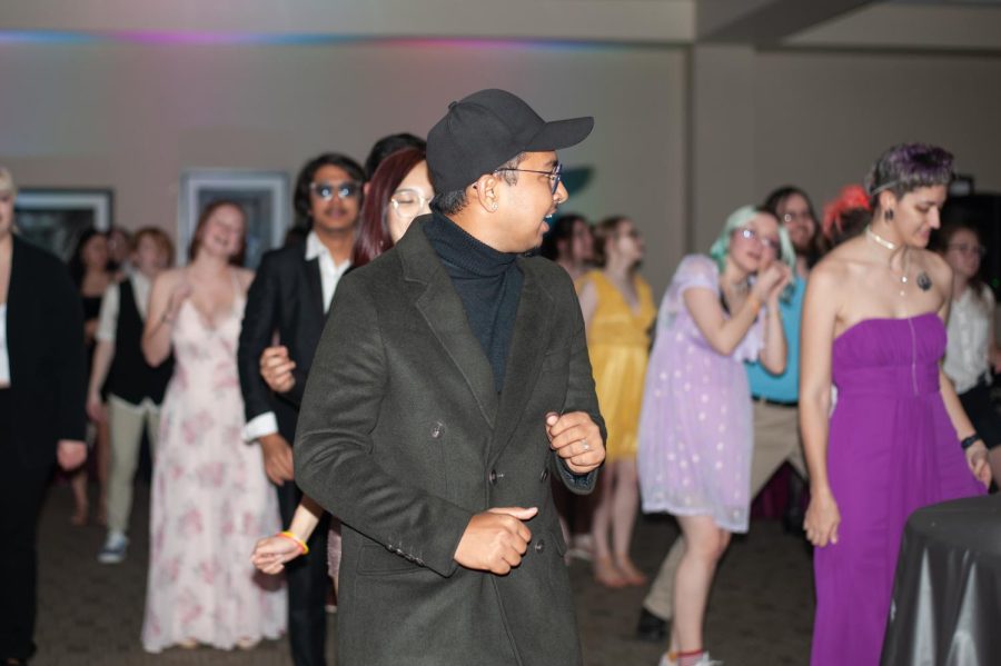 Pride Prom attendees and Spectrum members dance during Cha Cha Slide by DJ Casper on April 22.