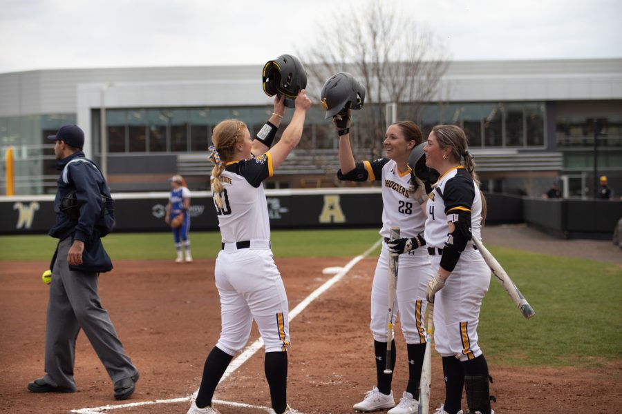 Sophomore+Addison+Barnard+celebrates+after+hitting+a+three-run+homer+on+Apr.+3.+Barnard+hit+five+homers+during+the+three+game+series+against+Tulsa+in+Wilkins+Stadium.