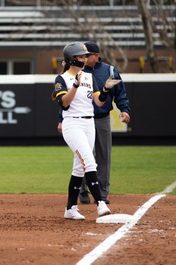 Sophomore Lauren Lucas celebrates at first base during the matchup against Tulsa in Wilkins Stadium. Lucas finished the day with 2 hits and 1 RBI on Apr. 3.