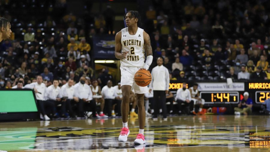 Freshman Chaunce Jenkins looks to drive during the game against Tulsa on Feb. 1 inside Charles Koch Arena.