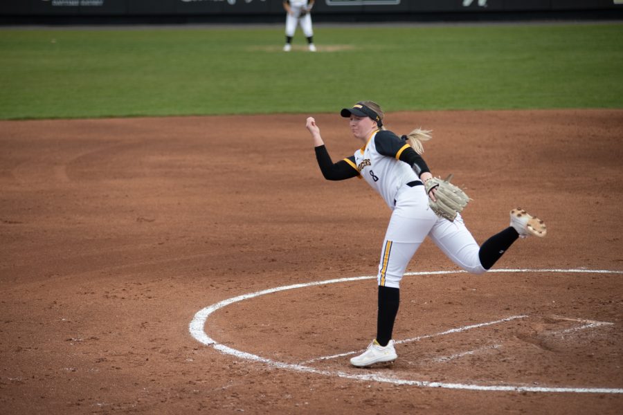 Senior Caitlin Bingham throws a curveball against Tulsa on Apr. 3. Bingham pitched a total of 3.1 innings.