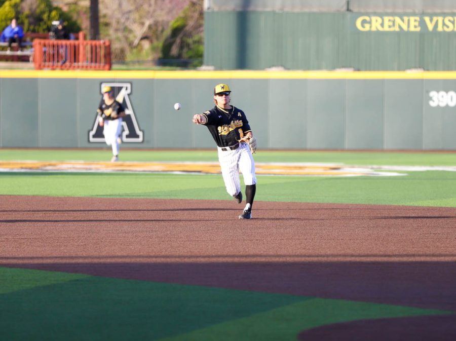 Sophomore Brock Rodden throws the ball to first base during WSUs game against Cincinnati on April 14 at Eck Stadium.