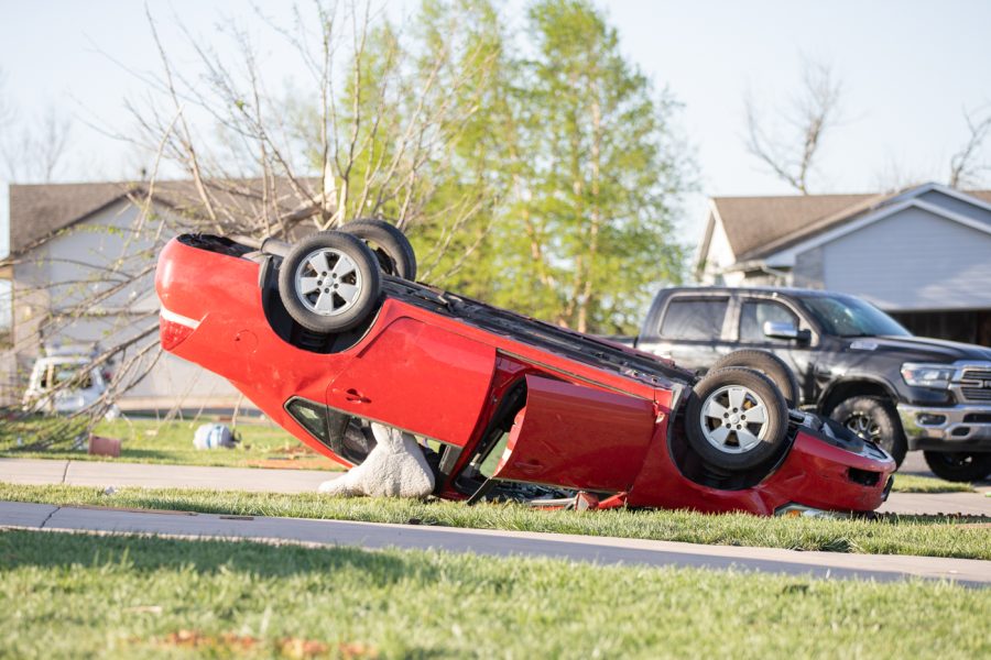 A car flipped over on impact to the Andover tornado on Apr. 30. The car is located on Stonewood Street.