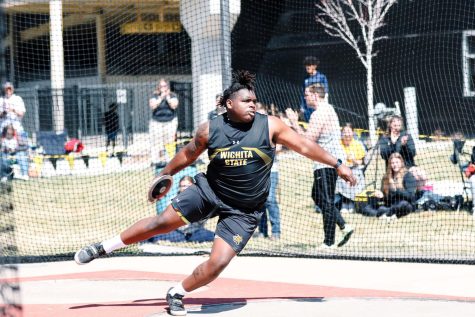 Junior Dae’Trell Gordon prepares to throw the discus during the KT Woodman Classic on April 9 at Cessna Stadium.