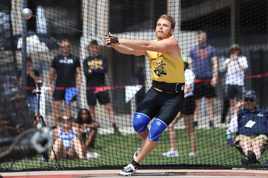 Senior Michael Bryan launches his hammer in the Mens Hammer throw competion of the AAC Championship. Bryan finished first place on May 13 with a 69.22m throw.