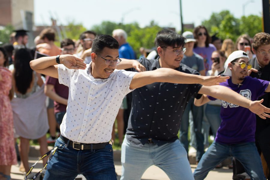 Students dance after the end of the first Spring 2022 Commencement Ceremony.