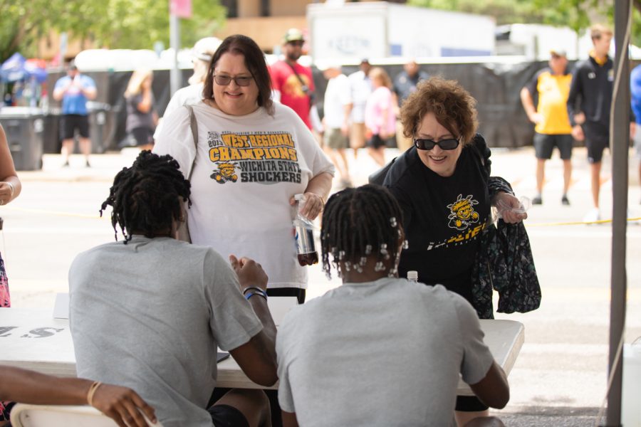 WSU fans meet with the 2022-2023 mens basketball team during Riverfest on June 5.