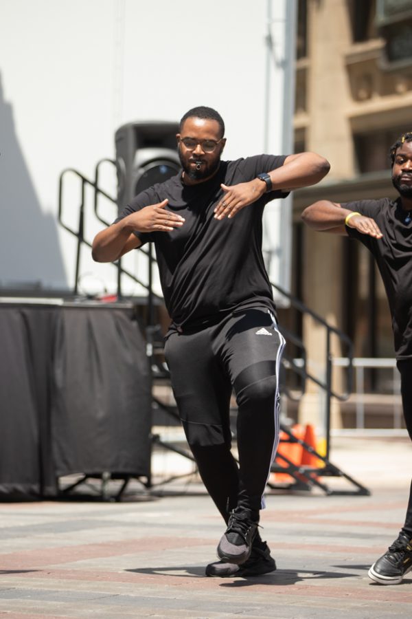 A Alpha Phi Alpha member competes in the Riverfest Stroll Off Competition on June 5.