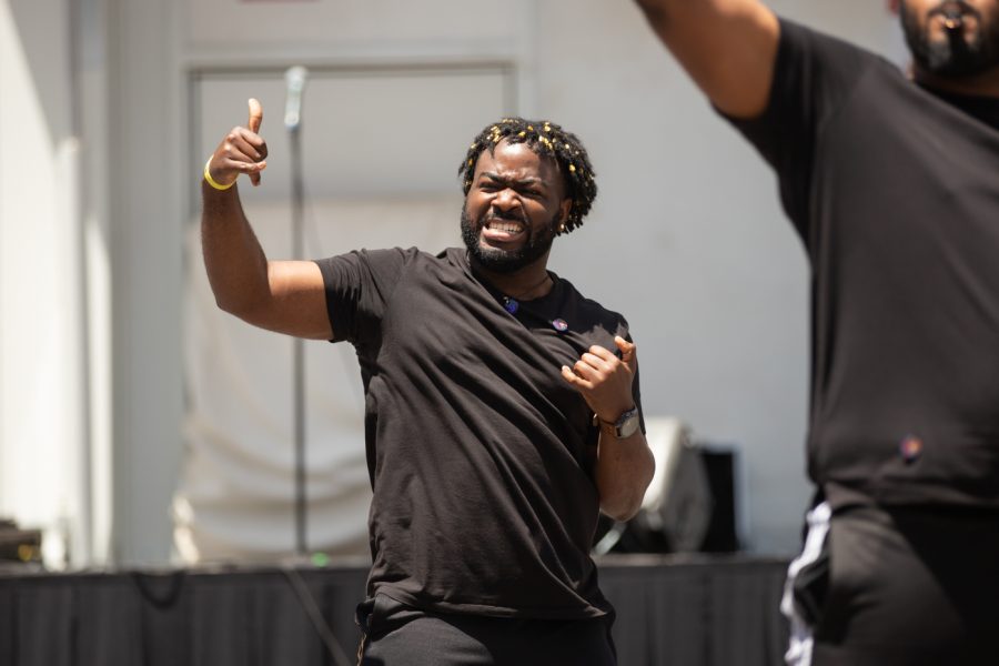 An Alpha Phi Alpha member competes in the Riverfest Stroll Off Competition on June 5.