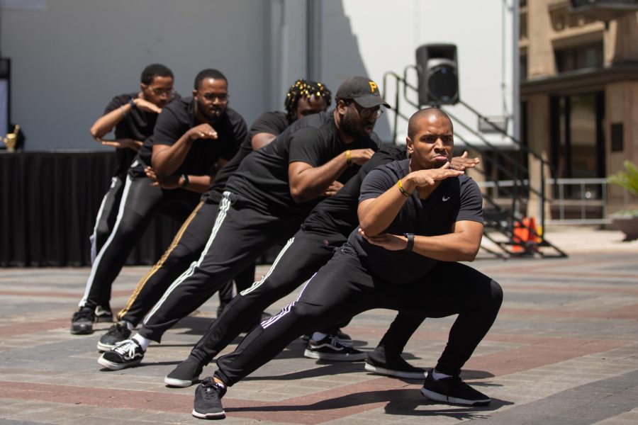 Alpha Phi Alpha members compete in the Riverfest Stroll Off Competition. The event was a historical and cultural component of Black and multicultural Greek life, where teams danced to crease a unified whole.