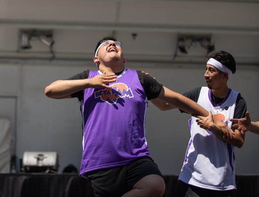 Sigma Lambda Beta members perform a routine during the Stroll Off Competition during Riverfest on June 5.
