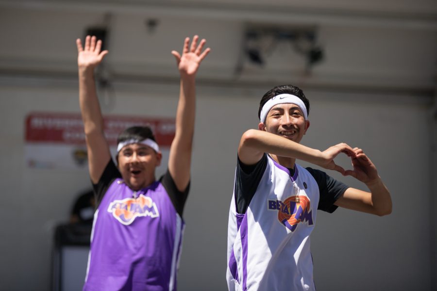 Sigma Lambda Beta members shout out to the crowd at the Stroll Off Competition during Riverfest on June 5.