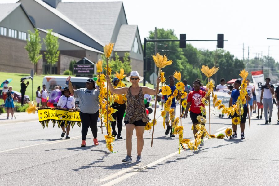 Shockers Sunflower group at Juneteenth ICT parade takes over 13th Street on Saturday, June 18th.