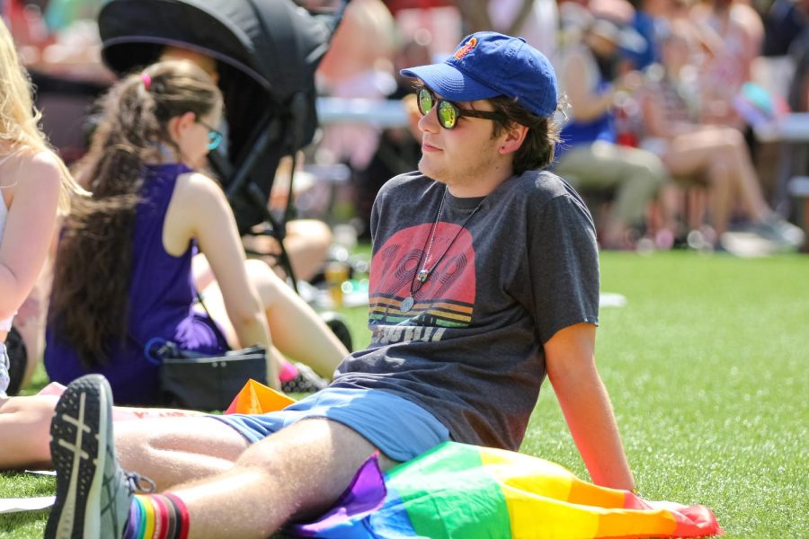 Owen Spurlock celebrates pride at Naftzger park with friends on June 25, 2022. “We don’t get a lot of chances to really explore who we are here, so I think it’s pretty awesome that we get to do that today. Spurlock said.