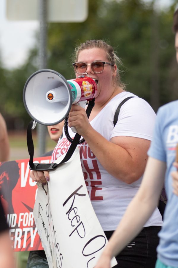 A Wichitan chants during the March for Liberty on July 9.