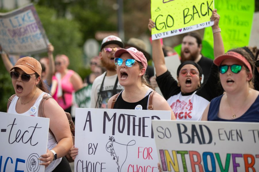 Members of the March for Liberty display their signs and chant on July 9 in support of abortion rights.