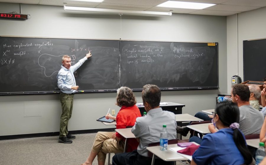 Mark Walsh, a mathmatics lecturer at Maynooth University, delivers a lecture series at Jabara Hall on Aug. 26. The lecture was titled The space of positive scalar curvature metrics on a manifold with singularities.