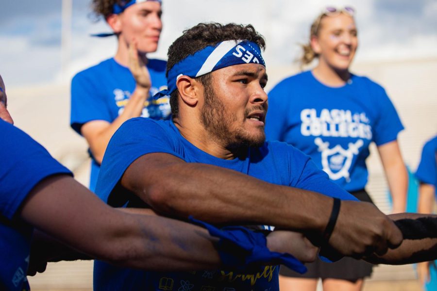 Freshman Xavier Westbrook battling the College of Health Science on Aug. 26 in Cessna Stadium. Westbrook and the College of Applied Studies took second place in tug-a-war after they claimed two out of three matches.