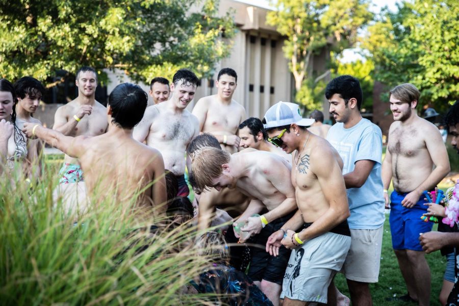 WSU student prepares water bubbles to hit each other at the beach party. The event was hosted by SAC at RSCs east courtyard on Aug 25.