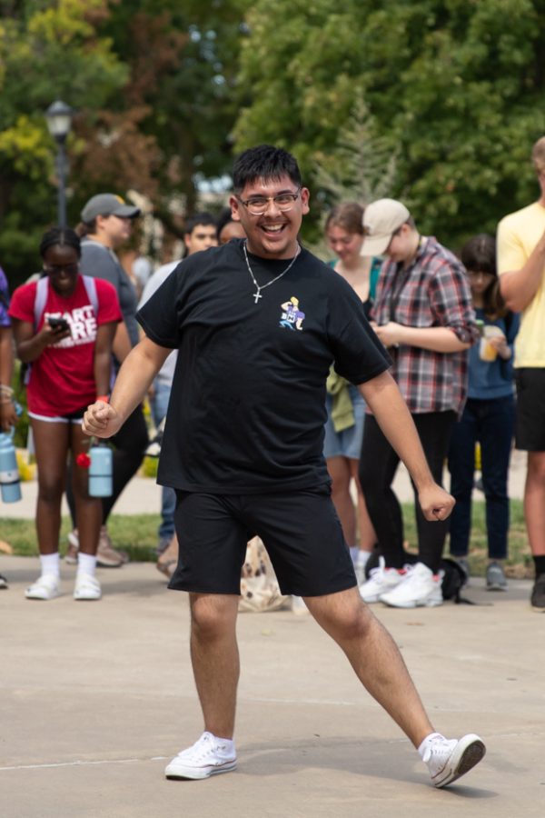 A Sigma Lambda Beta member dances during the Yard Show event outside the RSC on Aug. 29