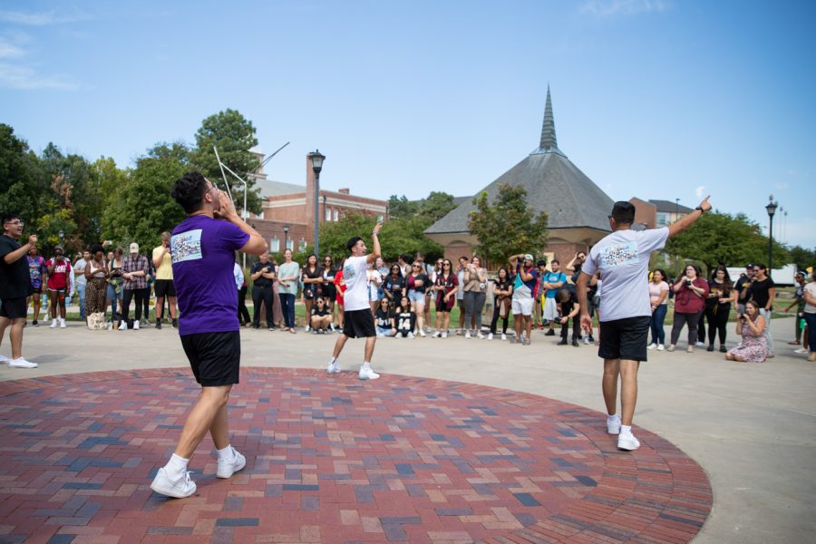 Sigma Lambda Beta fraternity members perform for a crowd during the Yard Show event hosted outside the RSC on Aug. 29.
