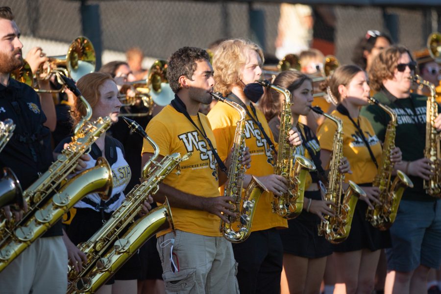 Members of the Wichita State band perform the National Anthem inside the Wichita Wind Surge stadium on Aug. 18.
