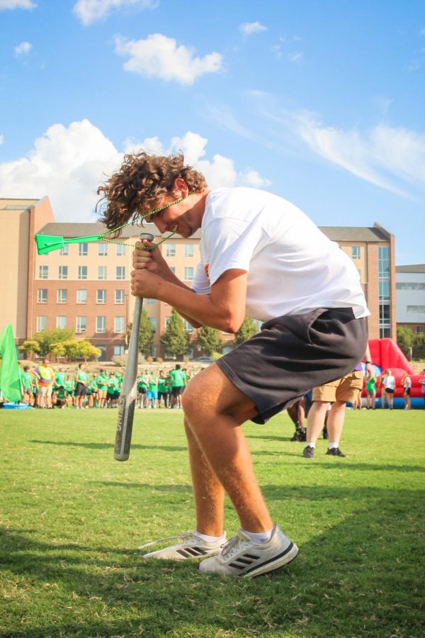 College of Health Professions student participates in the Dizzy Bat game. Clash of the Colleges was held on Aug. 26, 2022.