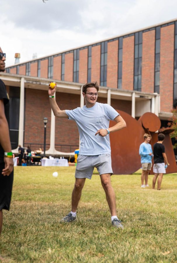 Senior Paul Armbrust throws ball at the Alpha Phi Sorority dunk tank at the greek carnival on Aug. 27.