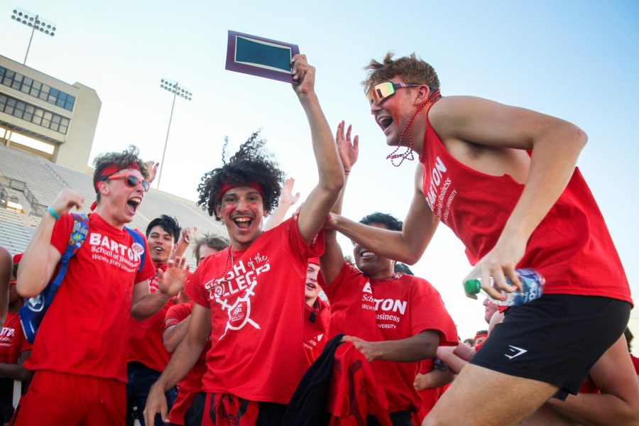 The College of Business celebrates after winning the Spirit Award at Clash of Colleges on Aug. 26, 2022.