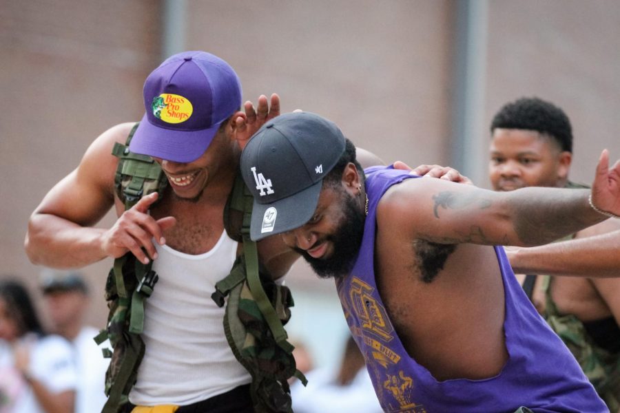 Omega Psi Psi Fraternity Inc. performs at the first annual NPHC Yard Show.
