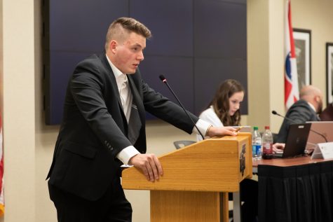 President Mitchell Adamson speaks to the senate during the SGA meeting on Aug. 31. Adamson spoke about his plans for the 65th session.