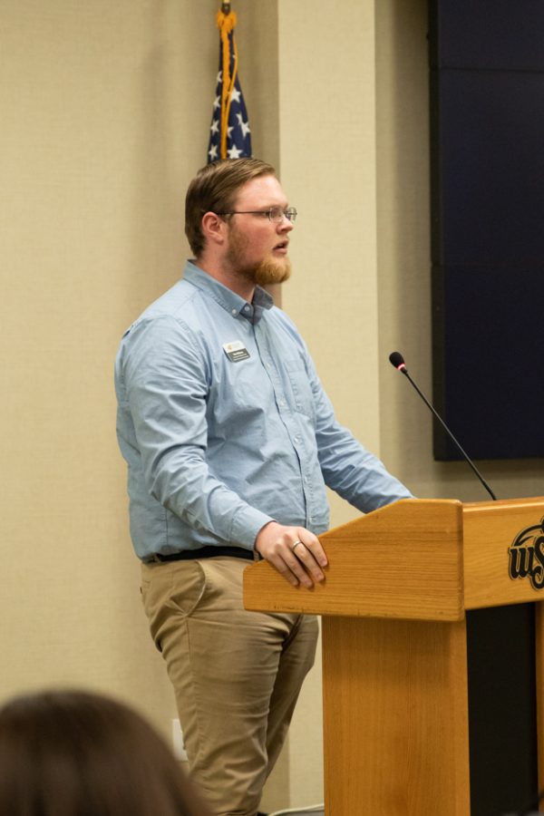 Kian Williams, SGA Government Relations Chair and At-Large Senator, speaks to the student body about the summer accomplishments for the 65th session.