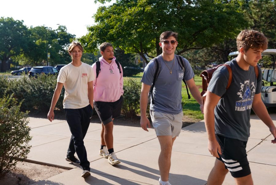 Shockers+walk+in+to+Wilner+Auditorium+during+the+Academic+Convocation+on+Sept.+8.+Academic+Convocation+is+the+official+academic+welcome+for+all+first-year+students.+