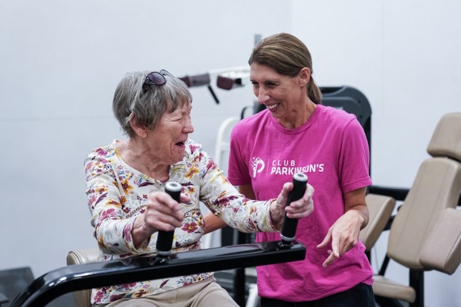 Angela+Flaherty+is+a+physical+therapist+at+Club+Parkinsons.+She+is+helping+a+club+member+with+an+exercise+on+Sept.+26+at+the+Heskett+Center.