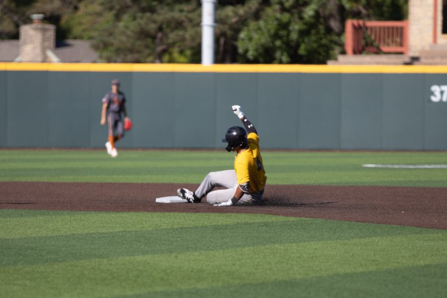 Sophomore Mauricio Millan slides to second base on Sept. 26 in Eck Stadium. Millan served as the Shockers catcher against the Mississauga Tigers.