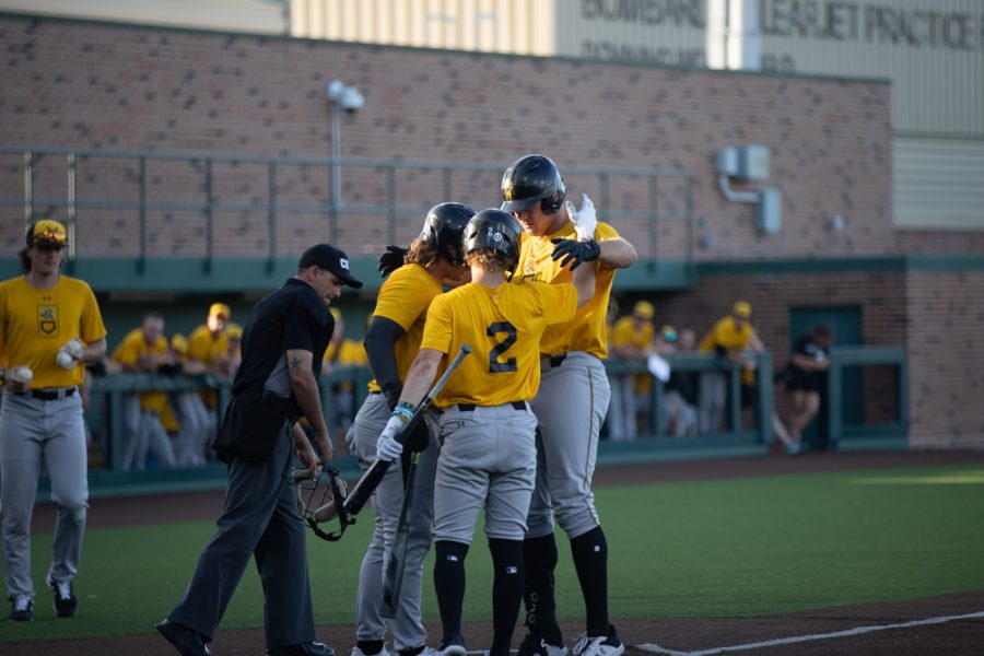 Sophomore Payton Tolle celebrates hitting the Shockers first homer of the day with his teammates. Tolles three-run bomb helped secure a 22-2 victory against the Mississauga Tigers on Sept. 26.