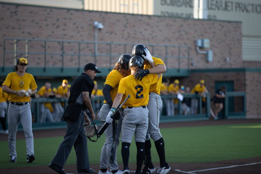 Sophomore Payton Tolle celebrates hitting the Shockers first homer of the day with his teammates. Tolles three-run bomb helped secure a 22-2 victory against the Mississauga Tigers on Sept. 26.