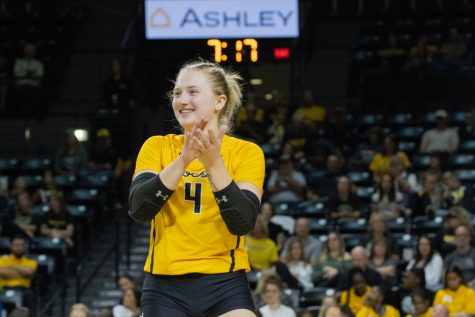 Junior Lily Liekweg celebrates a win against Temple on Sept. 23 at Charles Koch Arena. Liekweg had three assists and nine digs for the Shockers.