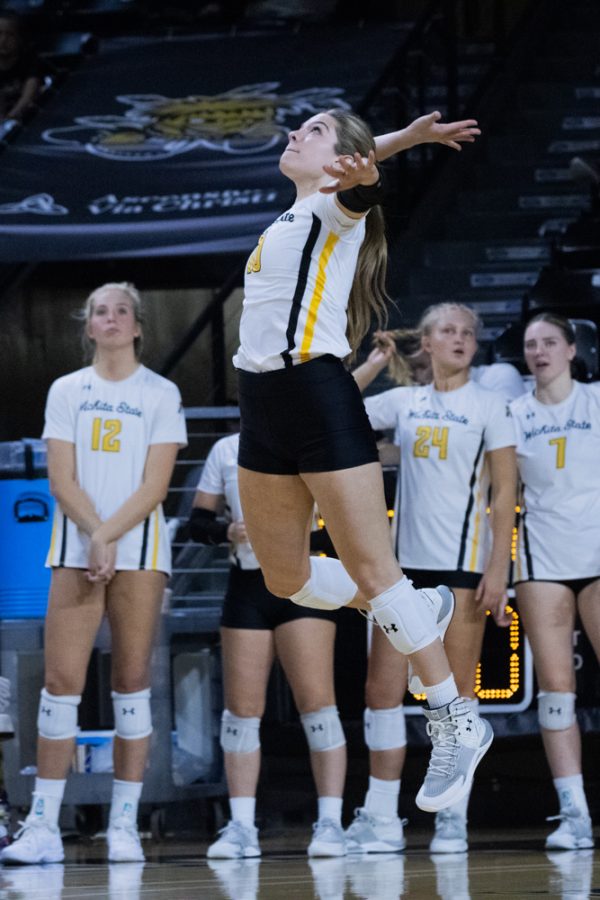 Sophmore Annalie Heliste serves the ball to Temple on Sep. 23. at Charles Koch Arena. Heliste completed two sets