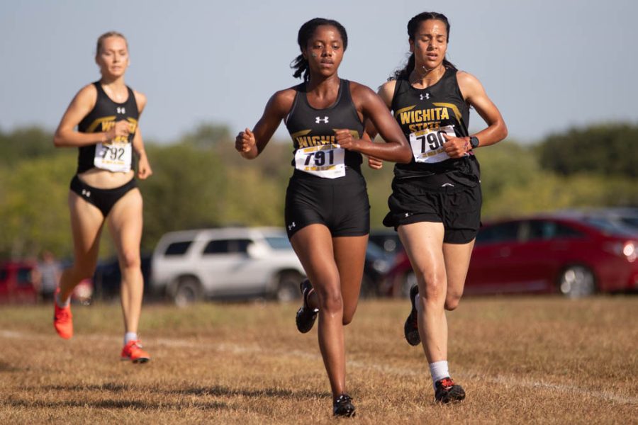 The womens cross country team takes an early lead during the JK Golden Class on Sept. 3 in Augusta. The team took first place with 15 scored points.