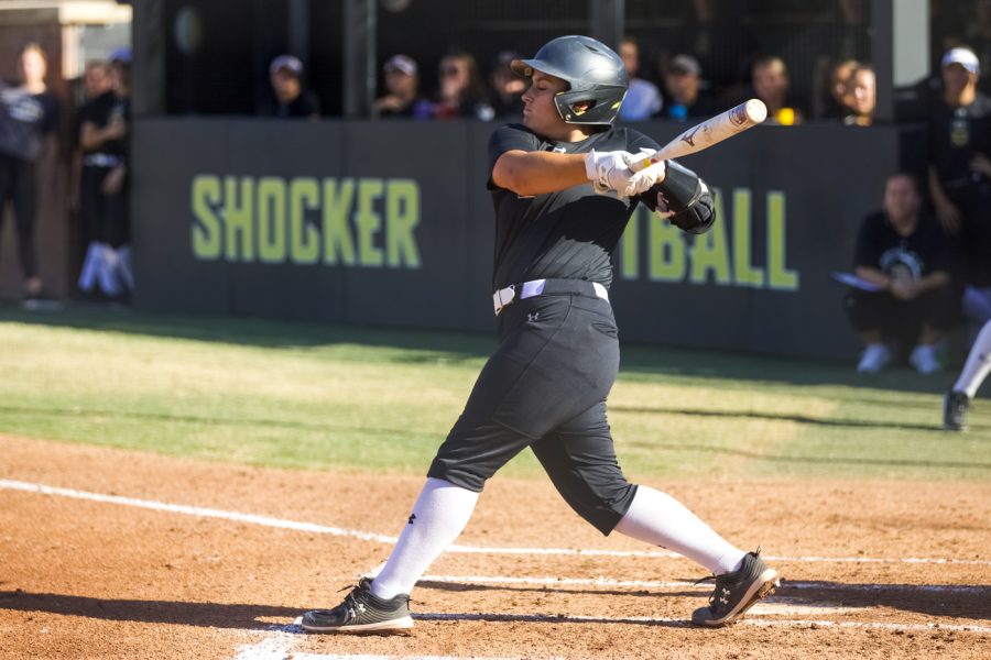 Jessica Garcia takes a swing during WSU’s game against Seminole State on Sept. 27 at Wilkins Stadium.