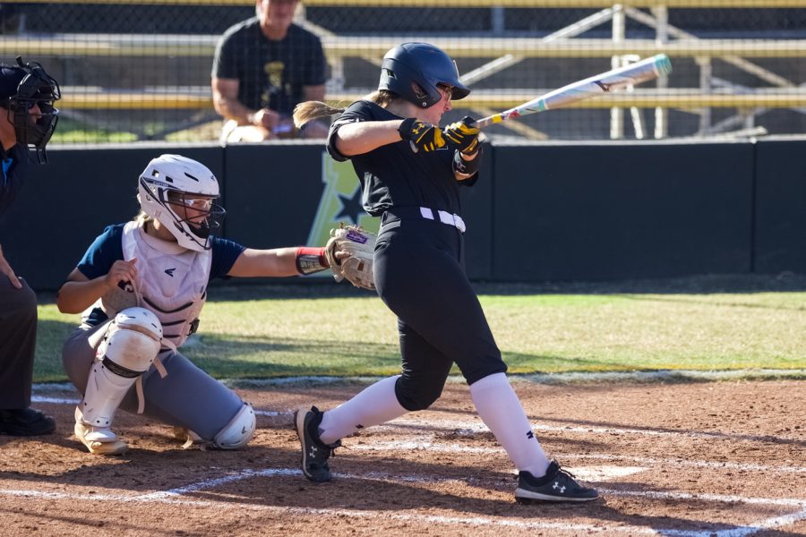 Krystin Nelson takes a swing during the game against Seminole State on Sept. 27 at Wilkins Stadium.