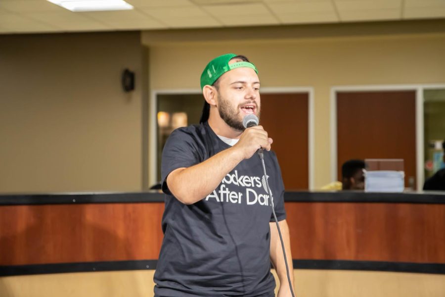Dylan Roy Lewis Morrow sings karaoke at the Shocker After Dark. The event was hosted by Student Affairs at RSC on Sept. 9
