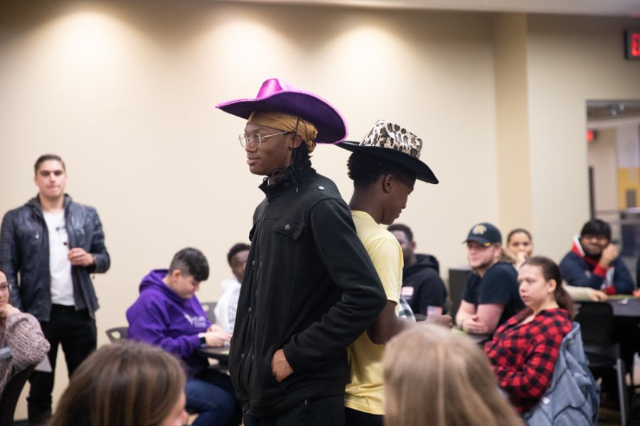 Sophomore Devon Robinson and Takomborerwa Nyapadi prepare for an old fashion brawl. To determine which student had the best hat, the two faced off in ultimate rock papper sissors.
