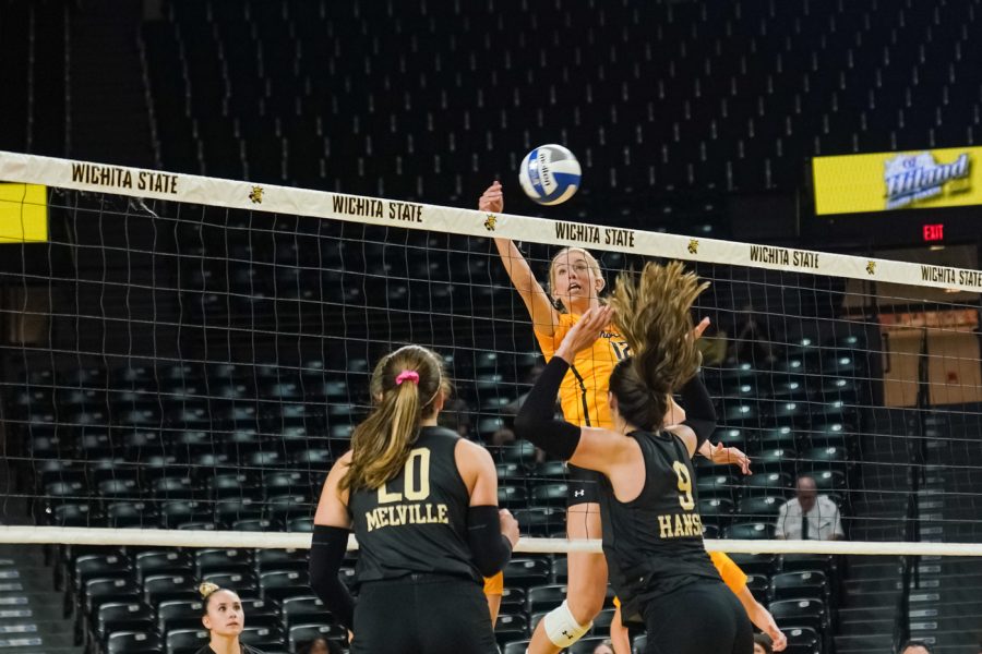 Lauren McMahon tips the ball during the match against UCF on Oct. 2 at Charles Koch Arena.